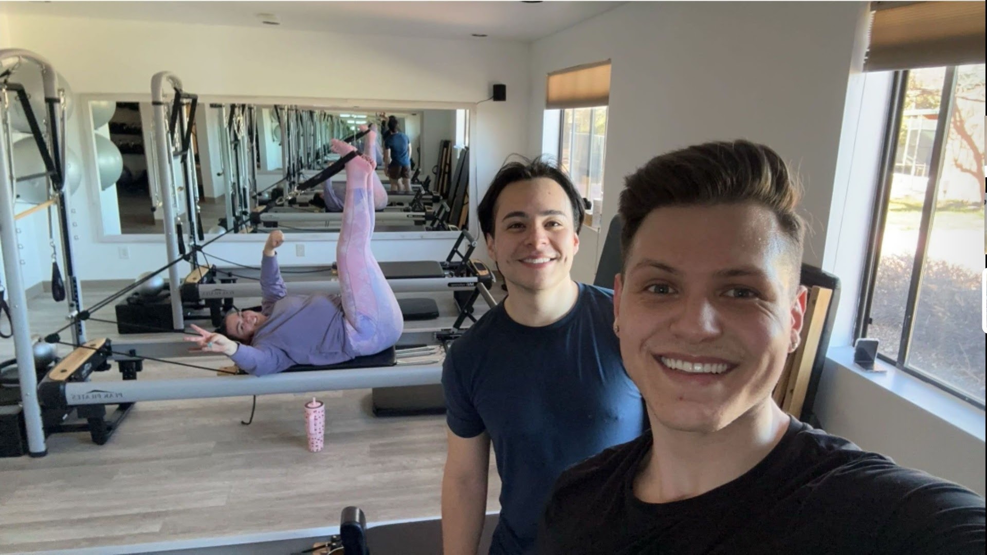 Debbie with clients in a Pilates studio